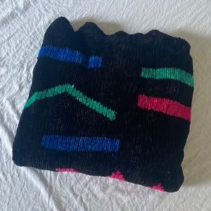 Vintage black sweater with abstract lines